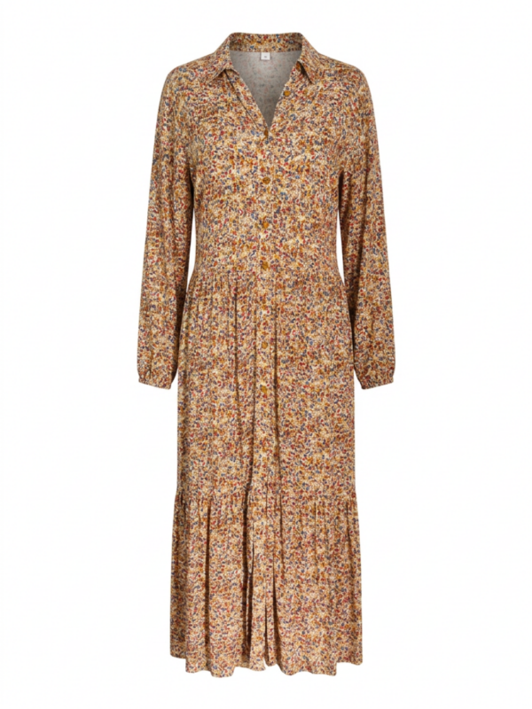 Vestido con esencia otoñal y falda con olanes de caída delicada